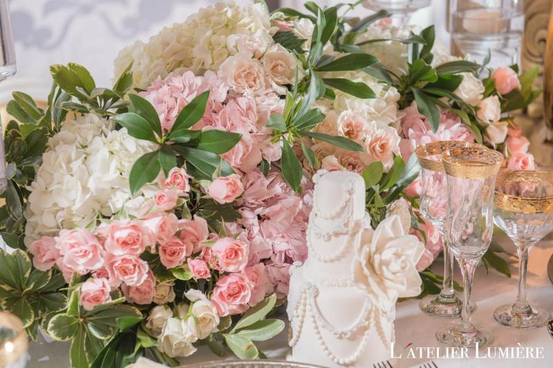 Blush pink floral arrangement with greenery by GPS Decors