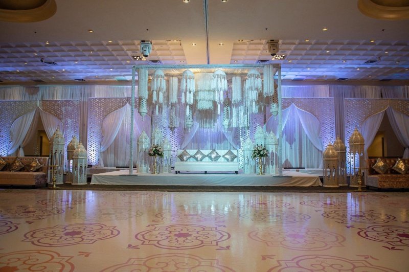 Crystal wedding stage with a glossy dance floor by GPS Decors