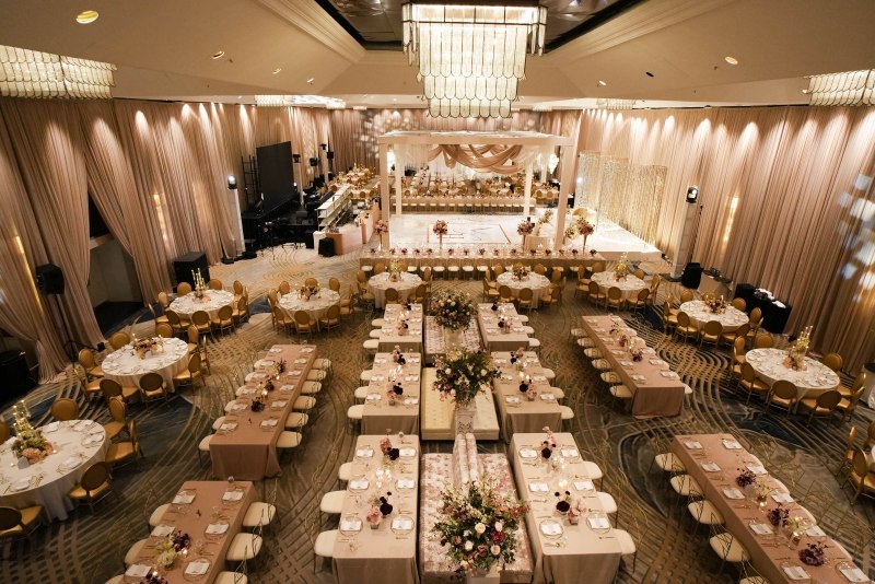 Fairmont ballroom with chandelier and long banquet tables by GPS Decors