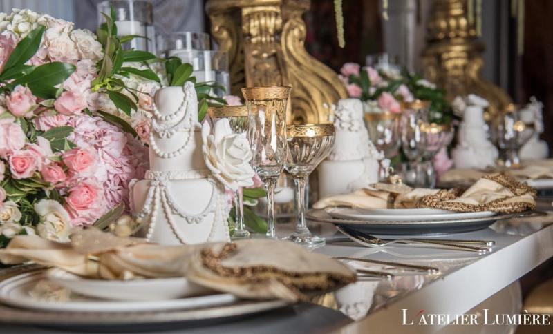 Gold-accented reception table with glassware by GPS Decors