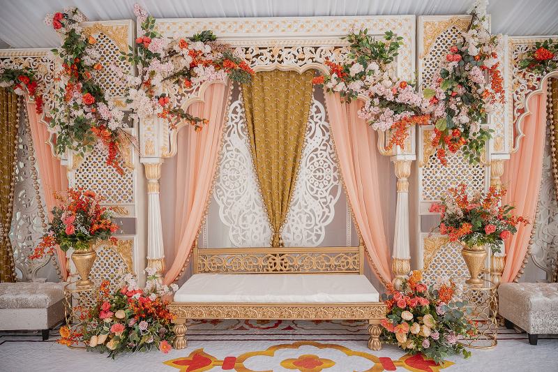 Jaago stage with peach and gold draping by GPS Decors