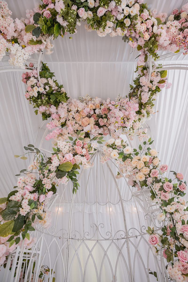 Blush and white floral arch for a mehndi by GPS Decors