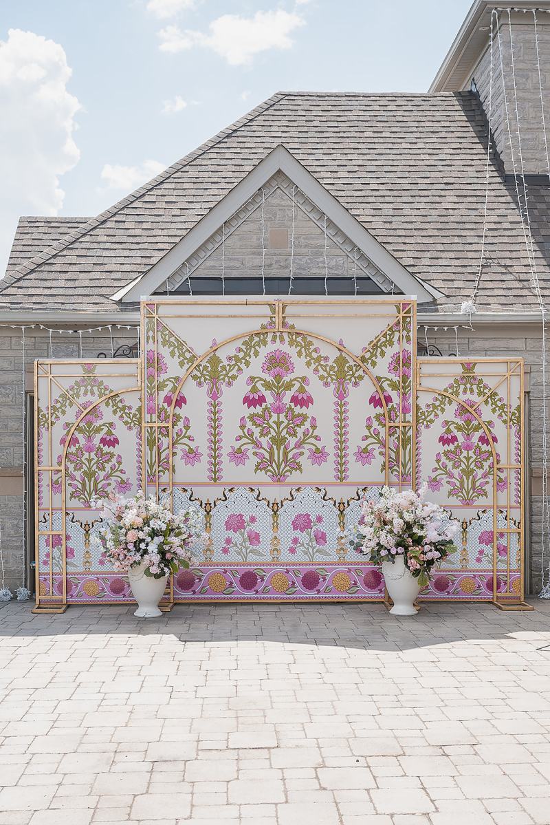 Mehndi backdrop with hand-painted floral panels by GPS Decors