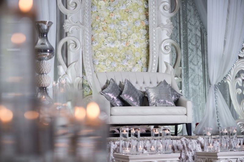 White floral wall with silver lounge seating by GPS Decors